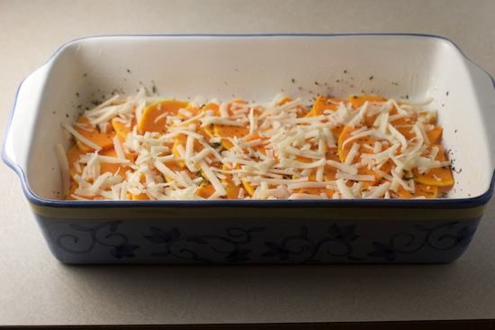 Sprinkle the squash with 1/3 of the salt, pepper, and thyme then sprinkle with about 1/2 cup of cheese.