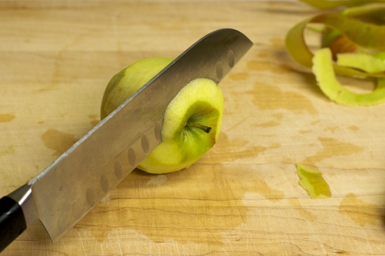 Next, cut a thin slice off the top of the apple.