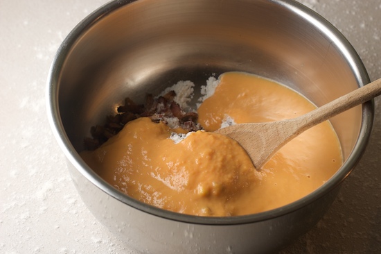 Pour the wet ingredients into the bowl with the dry ingredients and mix together.
