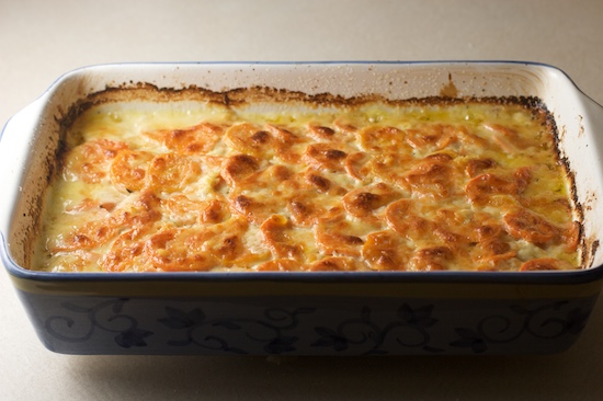 Bake the gratin, uncovered, in the upper third of the oven for an additional 20 minutes or until the top is nicely browned.  If you want it darker, pop it under the broiler for a few minutes at the end (make sure to watch it closely!).