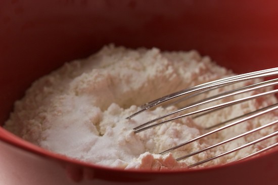 By measuring out and whisking the dry ingredients together, you ensure that the baking soda and salt will be evenly distributed throughout the batter. If you do it first and have it ready to go, your workflow will be much smoother!