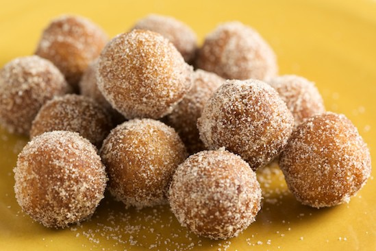 Pumpkin Spice Doughnut Holes rolled in cinnamon sugar | pinchmysalt.com