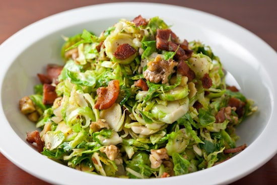 Shredded brussels sprouts with bacon and walnuts make a perfect, healthy, and seasonal fall side dish | pinchmysalt.com