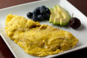 Curried Scrambled Eggs with Avocado and Fruit