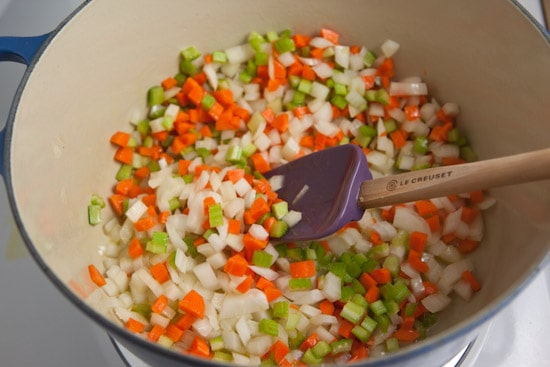 Onion, carrots, and celery cooking in butter and olive oil