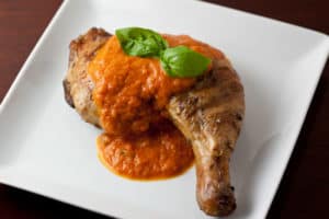 Grilled Chicken Under a Brick with Tomato-Cream Sauce