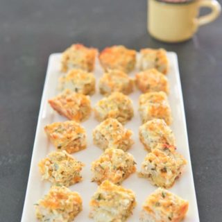 Artichoke Cheddar Squares are an easy and delicious classic appetizer made with canned artichoke hearts and shredded cheddar cheese. pinchmysalt.com