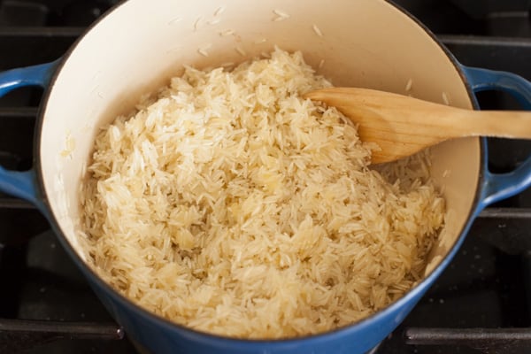 Sautéing rice for Green Chile Rice | pinchmysalt.com