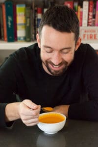 Phil eating Carrot Tomato Chipotle Soup