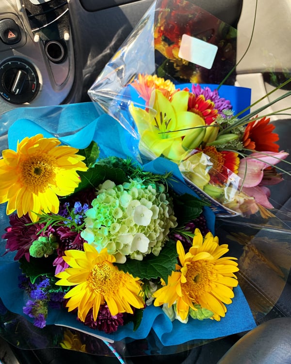 CA GROWN flower bouquets in my car