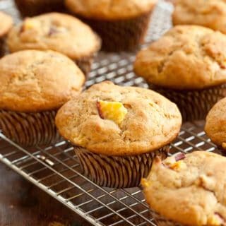 Nectarine muffins on a cooling rack